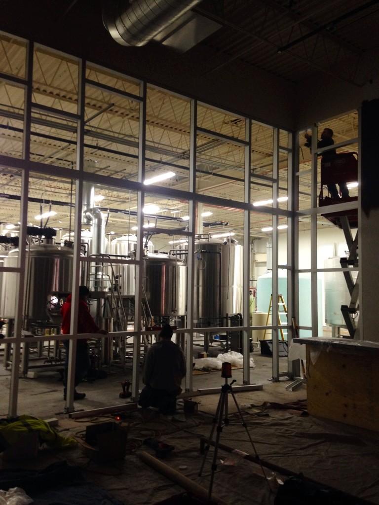 BadgerHillBeer's tweet photo. Working on the glass wall looking into the brewery from the taproom. #breweryupdate #mnbeer http://t.co/2SB9xDjJH8