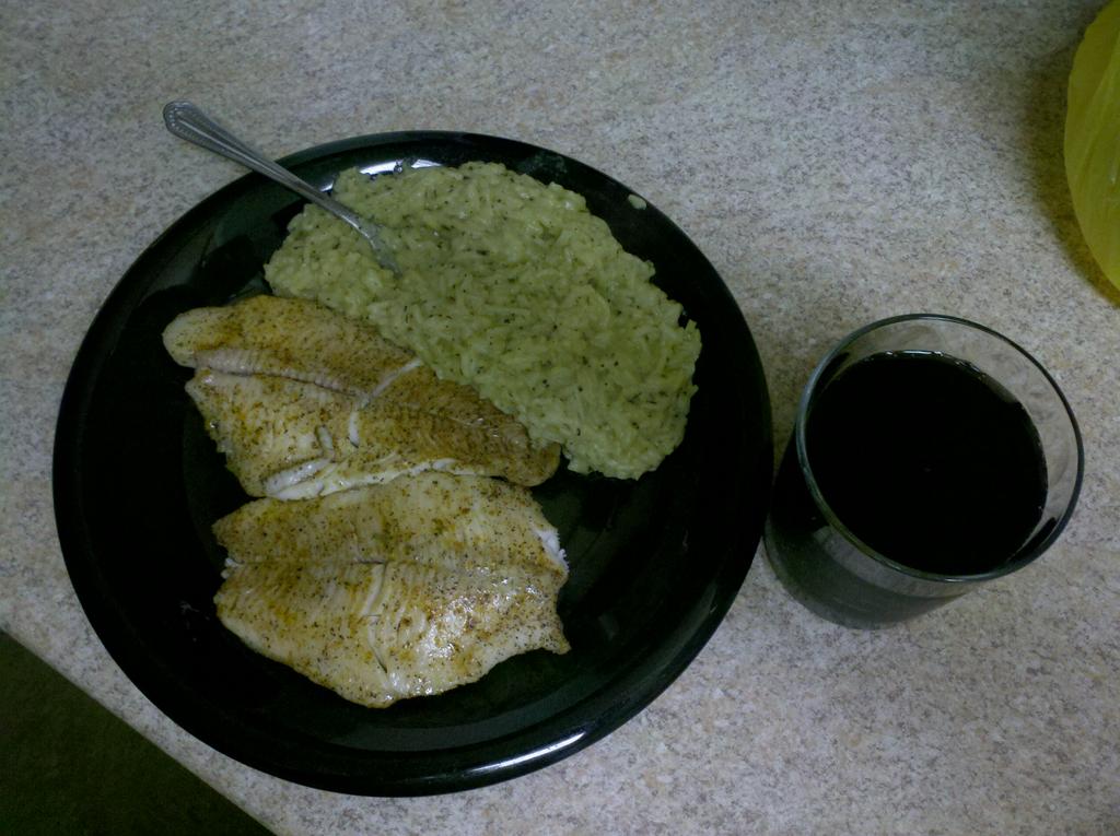 hooligan305's tweet photo. Fish rice and of course grape koolaid I'm in the building y'all and I'm running it http://t.co/gdB9jYYot3
