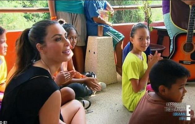kimkgif's tweet photo. It's sad how the media never shows this side of Kim Kardashian http://t.co/y317A4RVNi