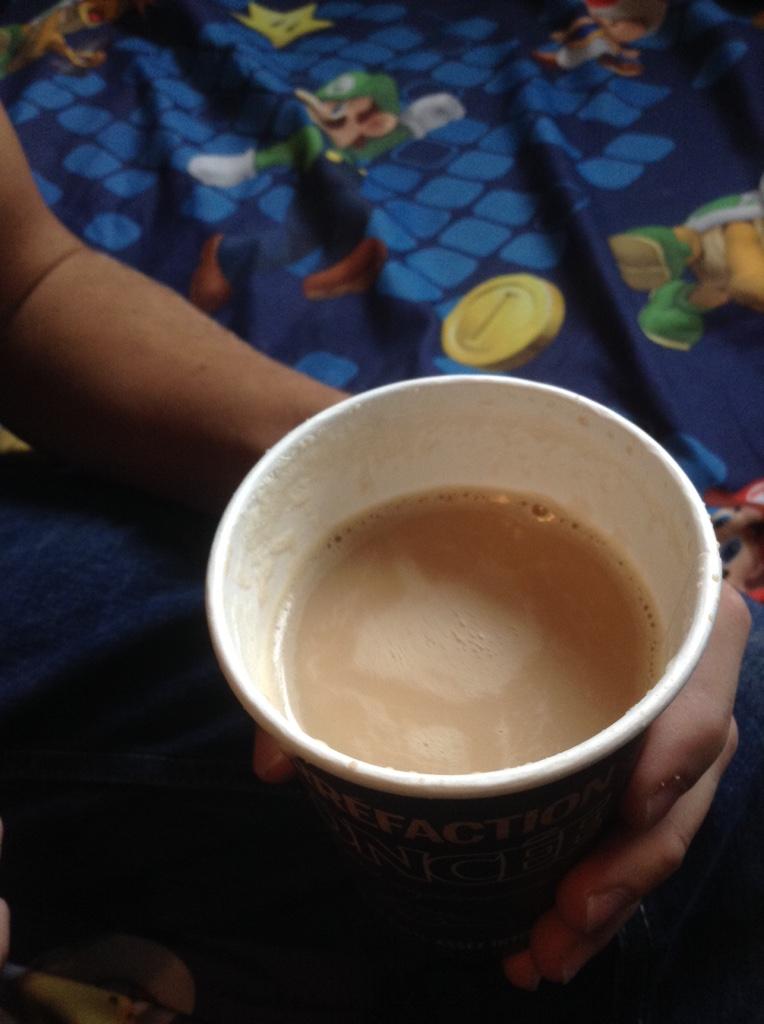 JohnnyyStewart's tweet photo. @TimHortons this is what happened when I opened the cup, barely over half full, not cool Timmies! >:( http://t.co/wSFl3Z2un6