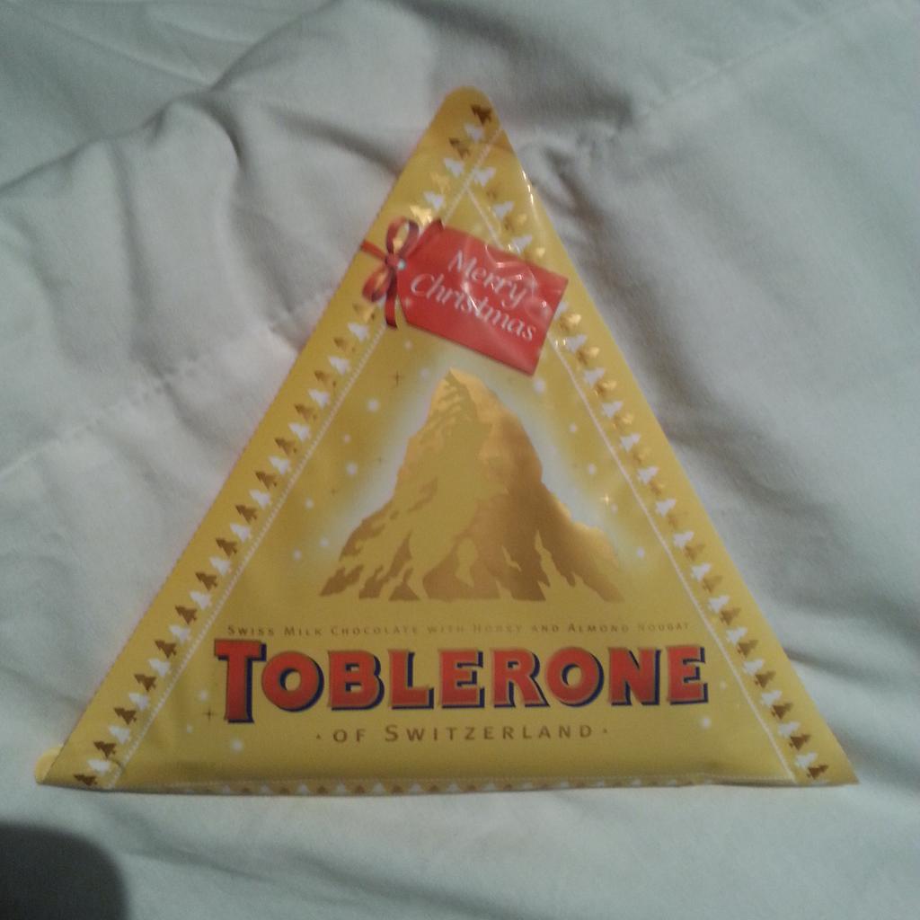 parasolpirate's tweet image. My first Christmas present! #toblerone #outonitsown #triangularchocolate
