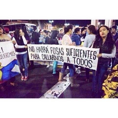 piedadcordoba's tweet photo. "No habrá fosas suficientes para callarnos a todos" #AccionGlobalporAyotzinapa  #Articulo39RenunciaEPN  #YaMeCansé http://t.co/TszbeKQoCE