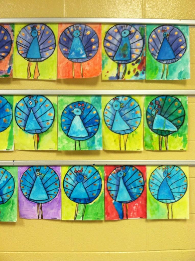 Kinder artists are using geometric shapes to create peacocks inspired by illustrator Celestino Piatti. #CGETwolves