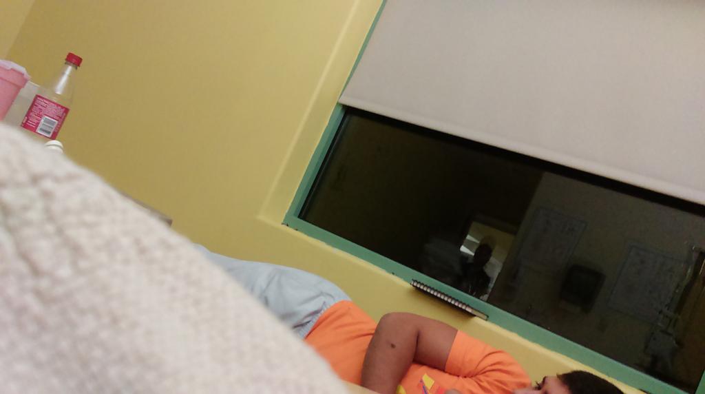 FABULOUSDENELL's tweet image. Watching #PanthersvsEagles with me bro. Staying the night at the hospital. #myfeet #differentsocks