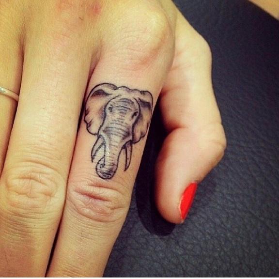 Tattoo womens hippie boho elephant finger hand  Hand tattoos for women  Tattoos for women Hand tattoos
