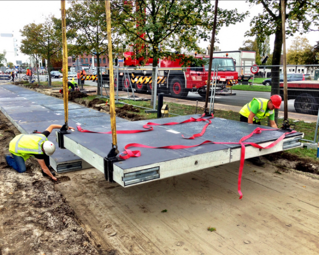 ClimatePower's tweet photo. The Netherlands is set to open the world’s first solar bike lane http://t.co/1hDmF06EcX http://t.co/3MaAphAUyV