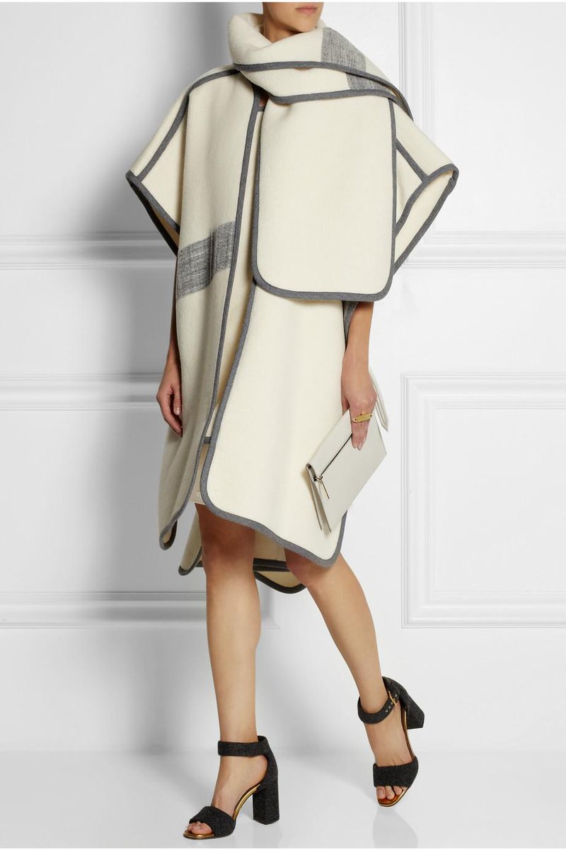 NETAPORTER's tweet photo. For instant impact, look to fall’s most dramatic outerwear, the cape. #FashionFantasies  http://t.co/NsxdxIDmxd http://t.co/3WioZRYcmp