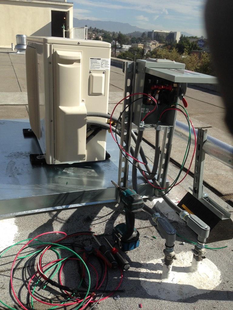maveruselectric's tweet photo. At #Mavelect tearing it up #ProudAmerican #electrician #doing right #DTLA #rooftop #condenser #loveLA http://t.co/QcbnYaSiAp