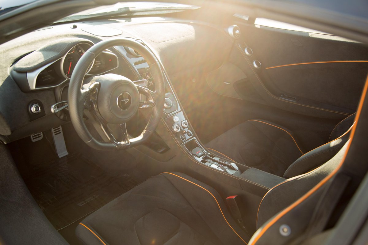 The McLaren 650S' steering wheel has the same girth as Hamilton's '08 #F1 car plus one millimeter. Why the extra mil?
