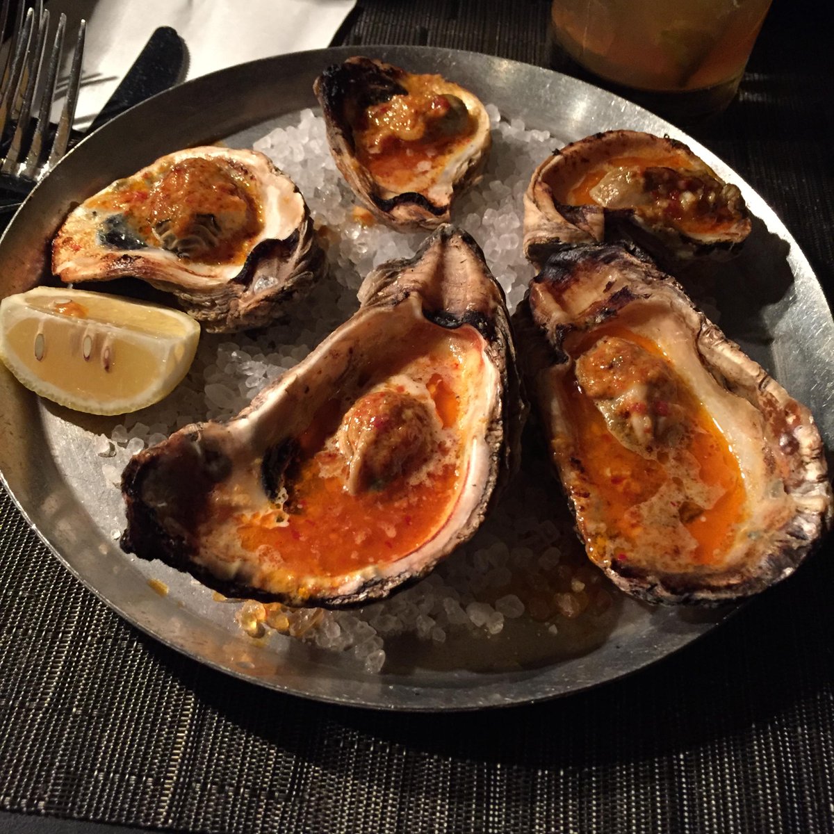 NPHFoodPorn's tweet photo. Cochon, in NOLA. Wood fired oysters with chili garlic butter sauce. A perfect dish! @CochonDining http://t.co/za4lXcI785