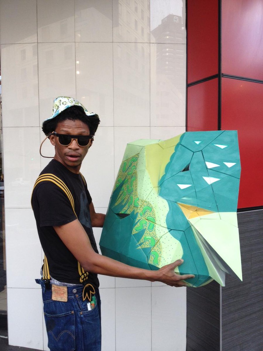 TAGeisler's tweet photo. An eagle head that can glow in dark. How cool is that! A Joint venture by Atang Tshikare (SA) and Mostlikely (AT) http://t.co/bsRJOI3JSP