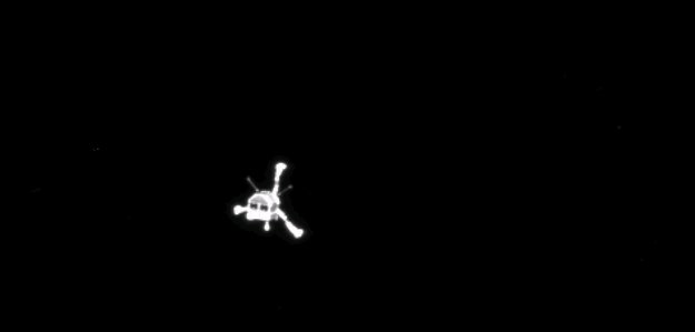 esascience's tweet photo. Touchdown! Rosetta’s Philae probe lands on comet. #CometLanding Press Release: http://t.co/peaA3RqUvC http://t.co/43V3wLCpY0