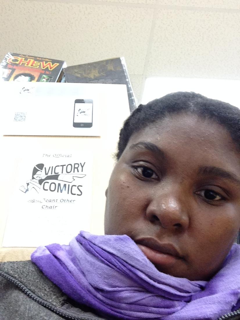 ninkeyj's tweet photo. New writing spot. The "significant other" chair at comic book store while boy child plays Dungeons and Dragons. http://t.co/RwHrbjEn71