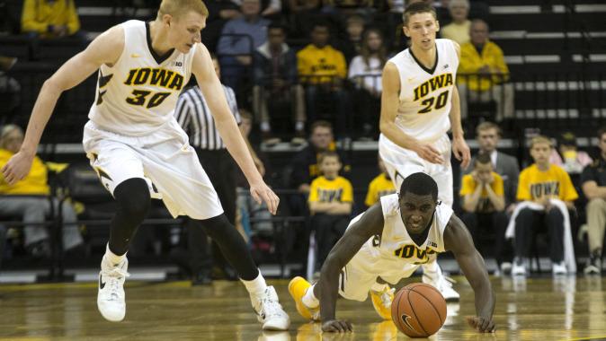 IowaHoops's tweet photo. There is no easing into the 2014-15 season for the Iowa hoops. #Hawkeyes http://t.co/27bHhqUeuV http://t.co/ECOTGmHA2y