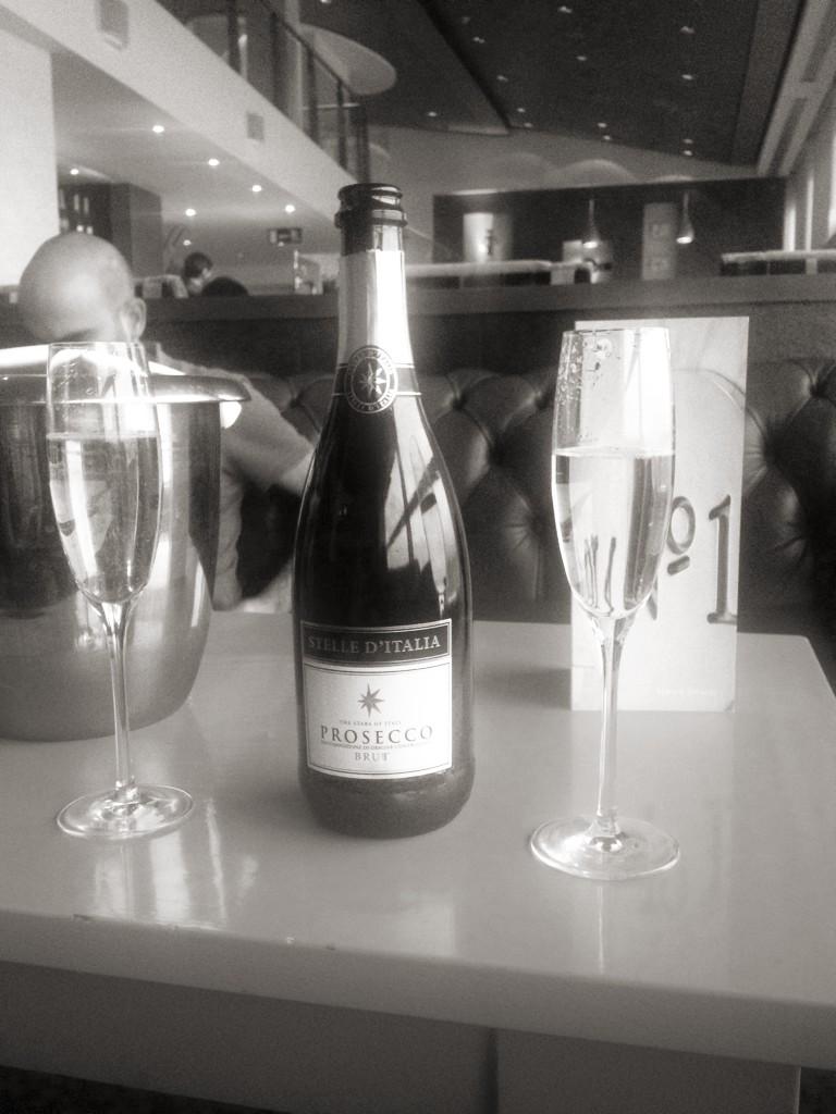 AGlassOfClass1's tweet photo. Barbados bound but first stop airport lounge and a bottle of bubbly! For starters! #Caribbeanexperience http://t.co/onglpz481a