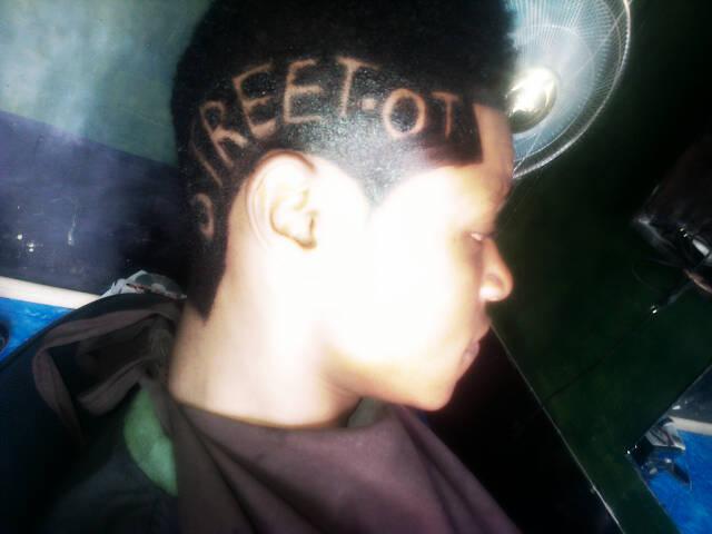 Die Hard Olamide Fan Crest Street OT On His Head In Anticipation For His Album (See Photo) B2TsMwkCQAEzGwI Die Hard Olamide Fan Crest Street OT On His Head In Anticipation For His Album (See Photo)