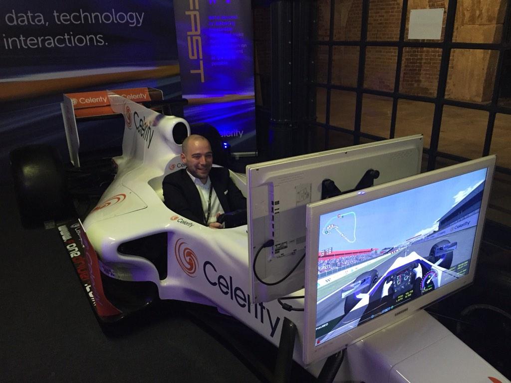 BrandworkzWorld's tweet photo. It's not all work and no play at #FoM2014, Brandworkz @neil_monahan using the Celerity F1 simulator http://t.co/BQGu7AXoiD