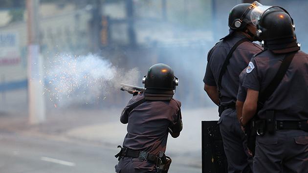 MotherJones's tweet photo. Brazil's police kill an average of six people a day http://t.co/NJAOrS3nBb http://t.co/x14MrGmp4i