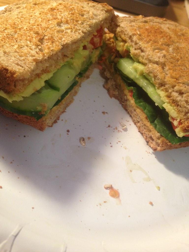 Fitprincess122's tweet photo. WAY too excited for this sandwich: hummus, avocado, tomatoes, cucumber and greens 👅💦💦💦 http://t.co/0EawKve1jy