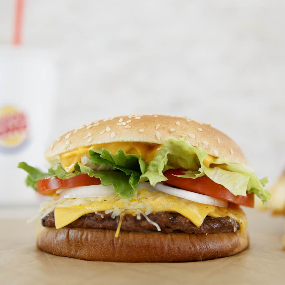 Burger King a X: The Four Cheese Whopper. Deliciously cheesy.   / X