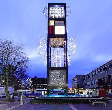 MrTimDunn's tweet photo. I wonder if the good burghers of Stevenage will accessorise their clock tower again this Xmas #modernismisdead :( http://t.co/DKvFvy34dW
