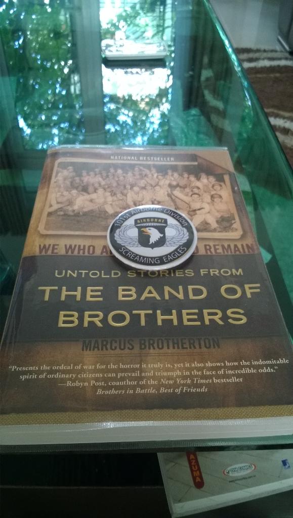 My beloved book and Screaming Eagle patch 
#bandofbrothers #screamingeagle #marcusbrotherton