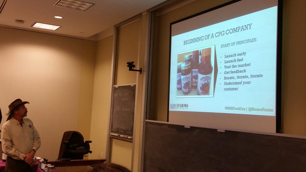 KarenOttoni's tweet photo. Learning about life post-accelerator with Norm's Farms Elderberry products at #mbafoodcon #dukefuqua #kenanflagler http://t.co/xkuYYGkt6d