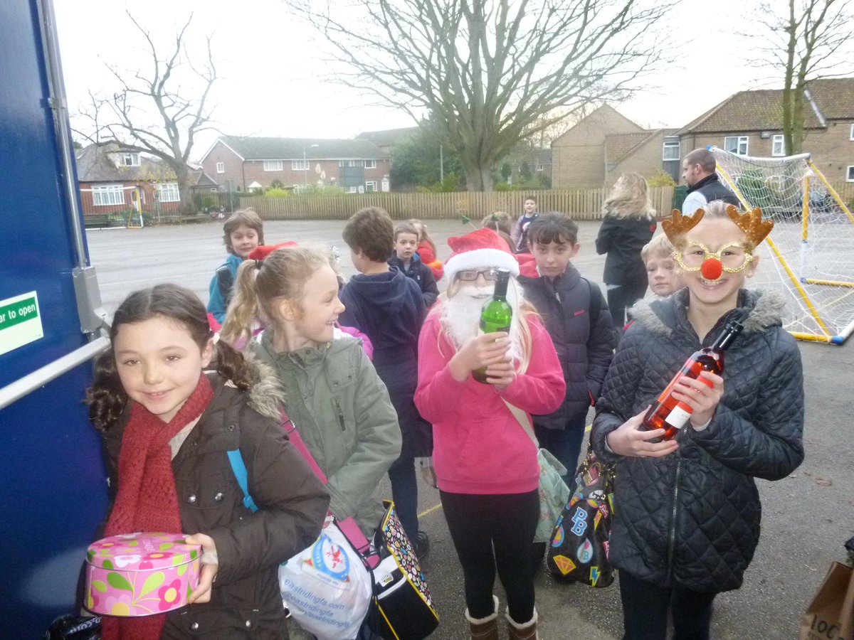 PCJS42's tweet photo. A big thank you for all our donations for the Christmas fair. Lots of fabulous festive jumpers worn today! http://t.co/9WWKRltYTF
