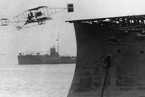 NYCAviation's tweet photo. Today in #AvHistory 1910: The aircraft carrier is born when Ely takes off from USS Birmingham: http://t.co/Lf2qgzjH4o http://t.co/ZBwA9emhRg