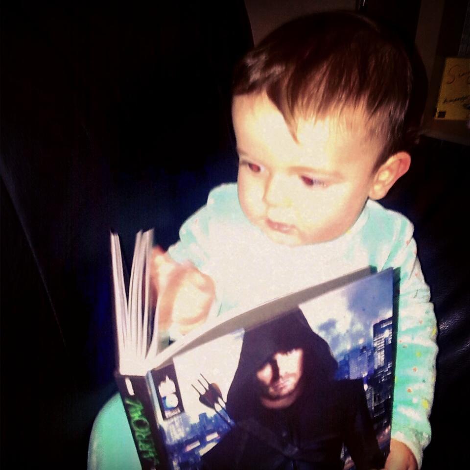 Zedruide's tweet photo. @amellywood here is my son erwan a young belgian fan of your tv show and now is reading the comic book. http://t.co/rLOJogwioc