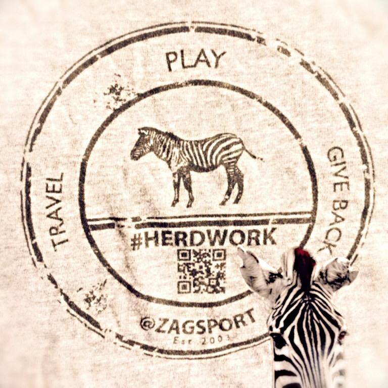 zagsport's tweet photo. Latest Zag Tee: #herdwork http://t.co/st4fPY2AIu  #travelplaygiveback http://t.co/rZLwpt6Jkw