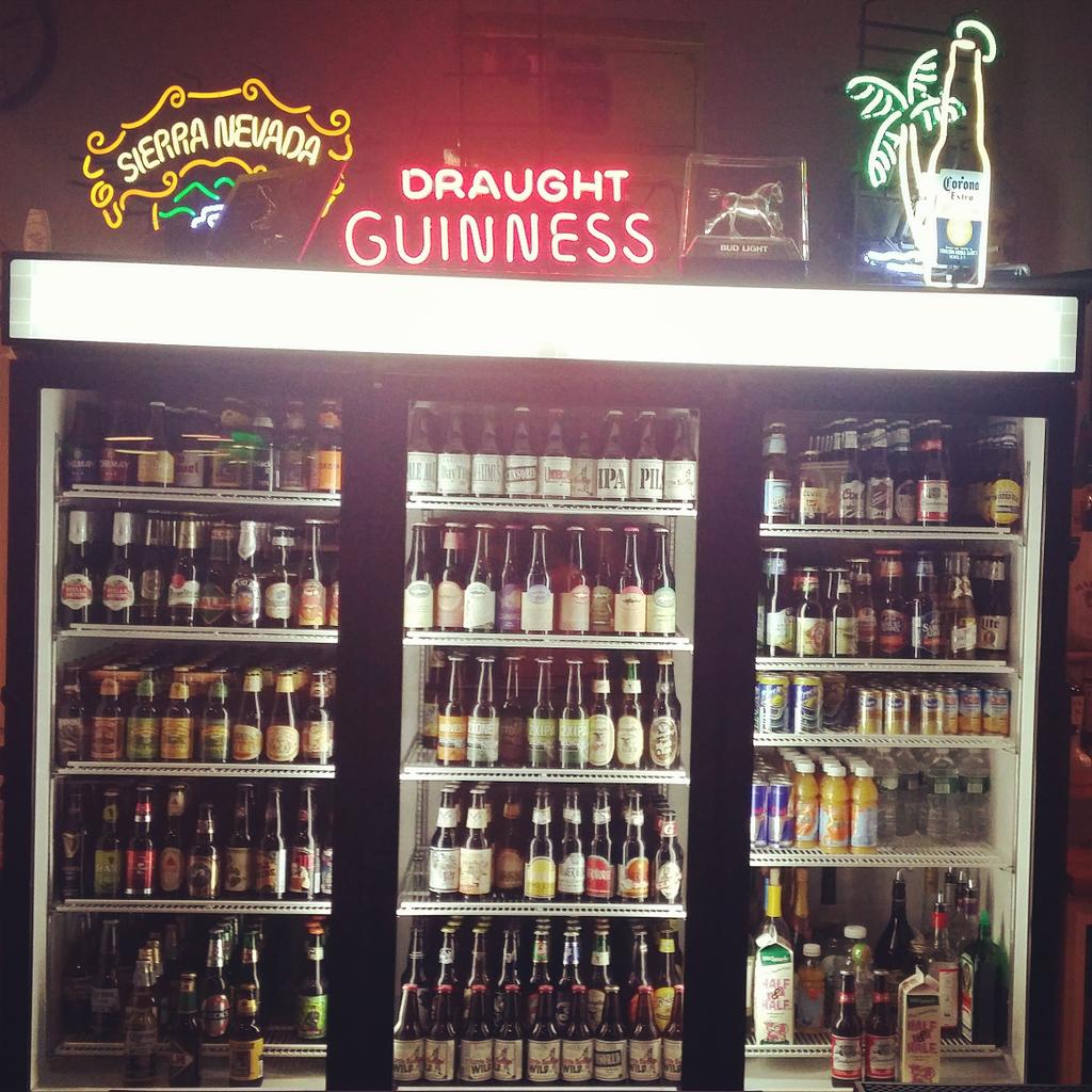 FastEddiesNM's tweet photo. Lots of #liquor and over 100 different #beers for you #beerlovers put there #fasteddies #poolhall #billards #music http://t.co/DSFLiFuA1V