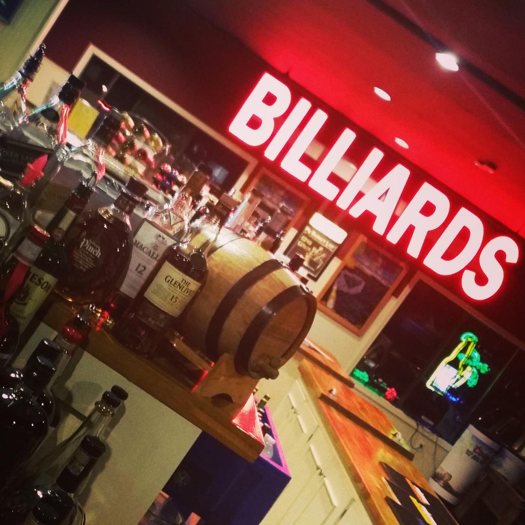 FastEddiesNM's tweet photo. Lots of #liquor and over 100 different #beers for you #beerlovers put there #fasteddies #poolhall #billards #music http://t.co/DSFLiFuA1V