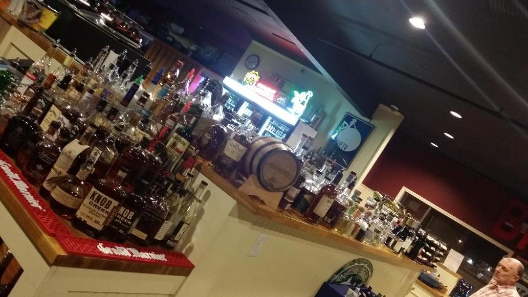 FastEddiesNM's tweet photo. Lots of #liquor and over 100 different #beers for you #beerlovers put there #fasteddies #poolhall #billards #music http://t.co/DSFLiFuA1V