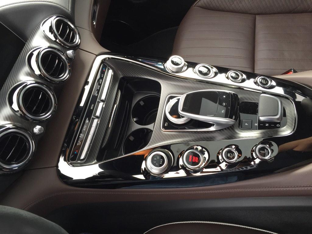 MercedesHouseBe's tweet photo. The interior is yummy too! MT @harrismonkey: AMG GT centre console, matte finish carbon, dark brown leather. Yum. http://t.co/ji2LJ760VF