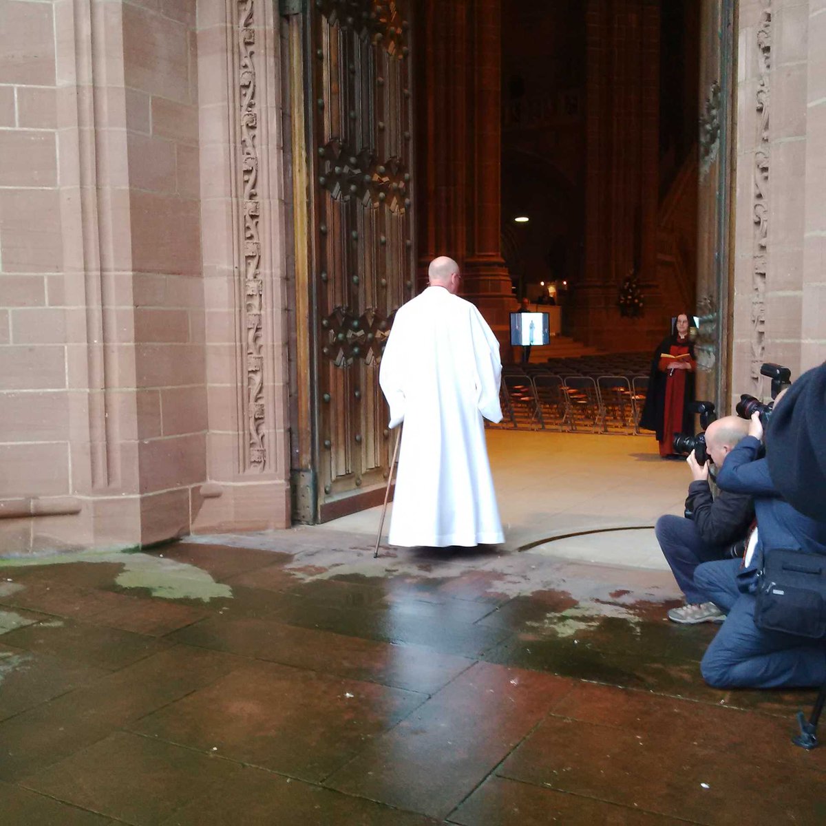 LivCathedral's tweet photo. The great West Doors open to admit @paulbayes as the #Installion service starts @LivCathChoir sing Spirit of the Lord http://t.co/4tL4H7EIfR