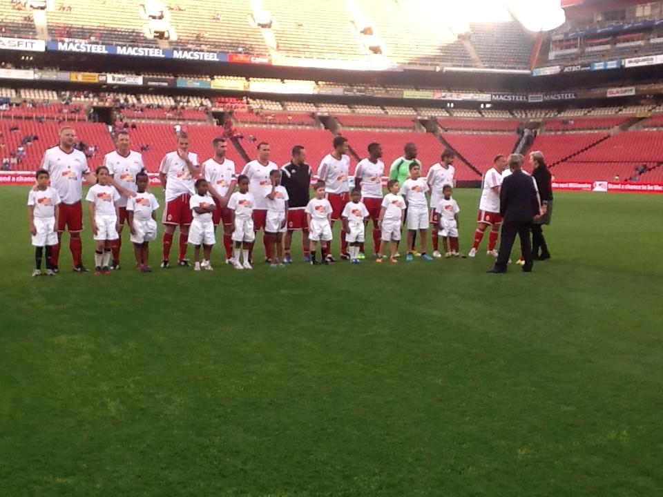 ukinsouthafrica's tweet photo. .@JudithMacgregor meeting @manclegends at #EllisPark. Good luck against @Orlando_Pirates! http://t.co/5mjPsgeayG