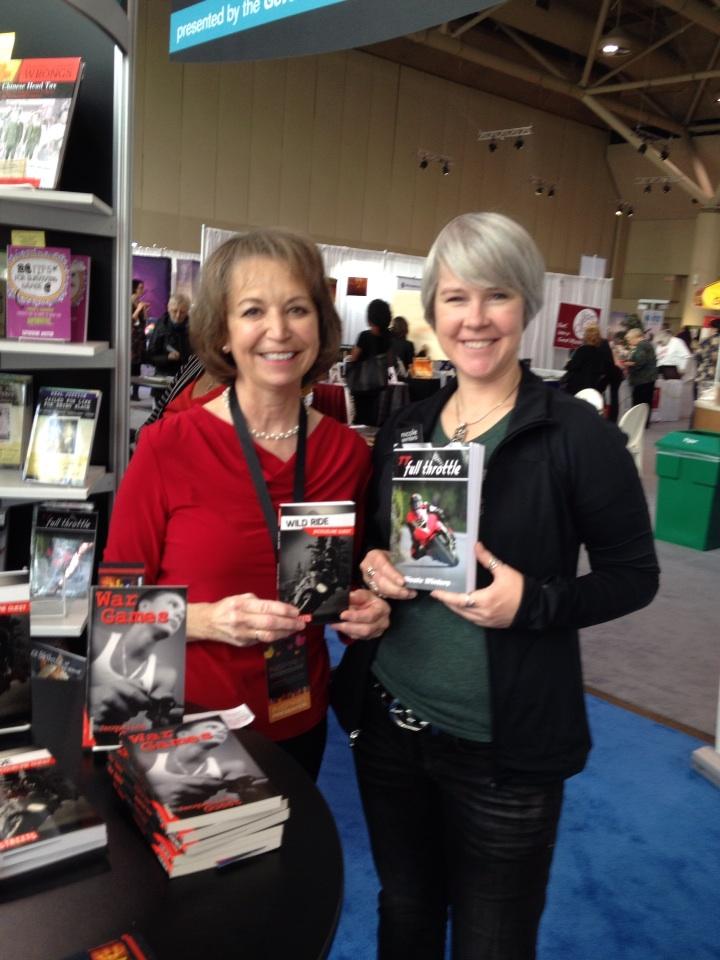 Nicole Winters and I signing at Lorimer booth.