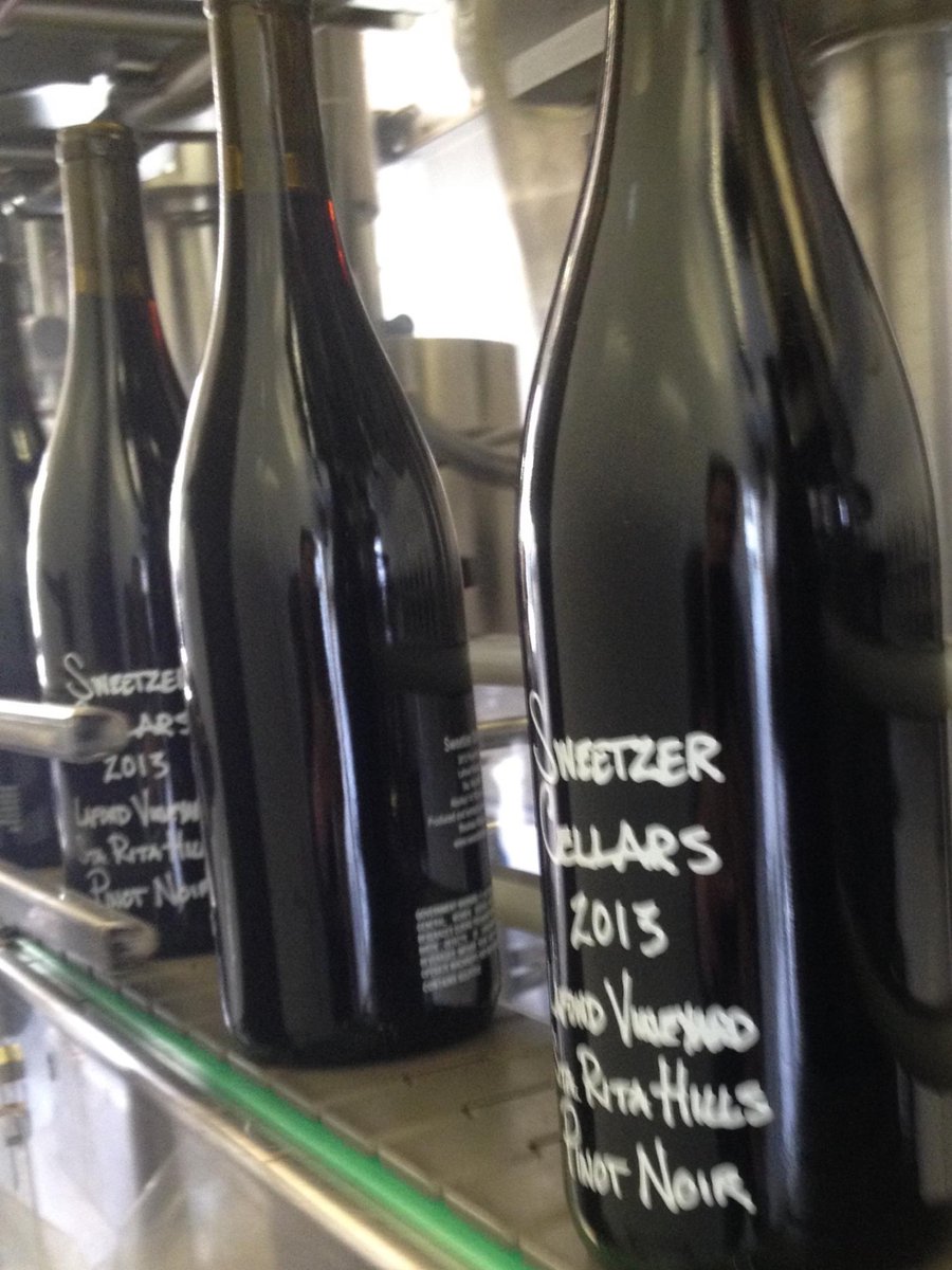 alarmedlisa's tweet photo. Can't wait to taste! “@SweetzerCellars: Our first vintage coming off the bottling line #2013 #pinot #staritahills http://t.co/1Jstr4GUw4”