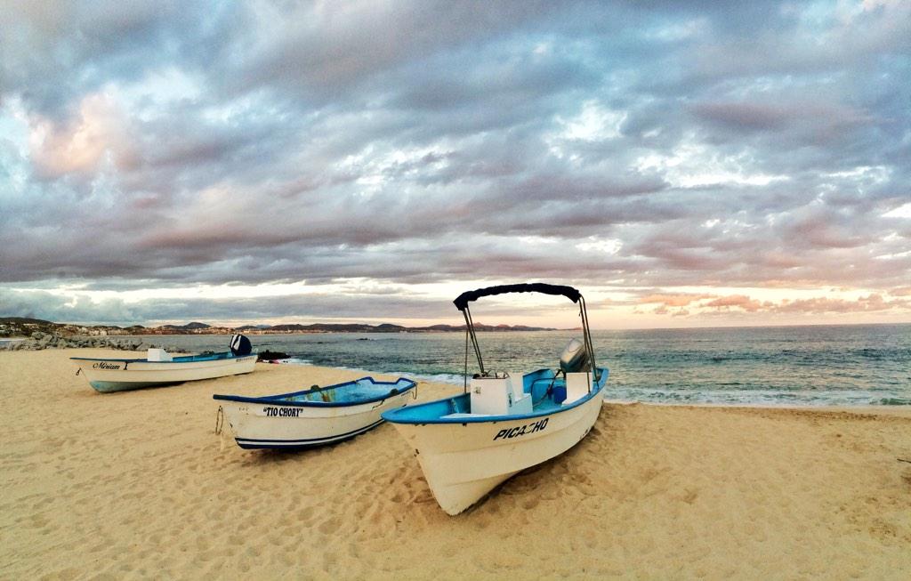 VillasDelMar's tweet photo. Fishing boats pulled up high at the end of the day on the beach next to our Club Ninety Six Beach Club http://t.co/yZd4df7CgP