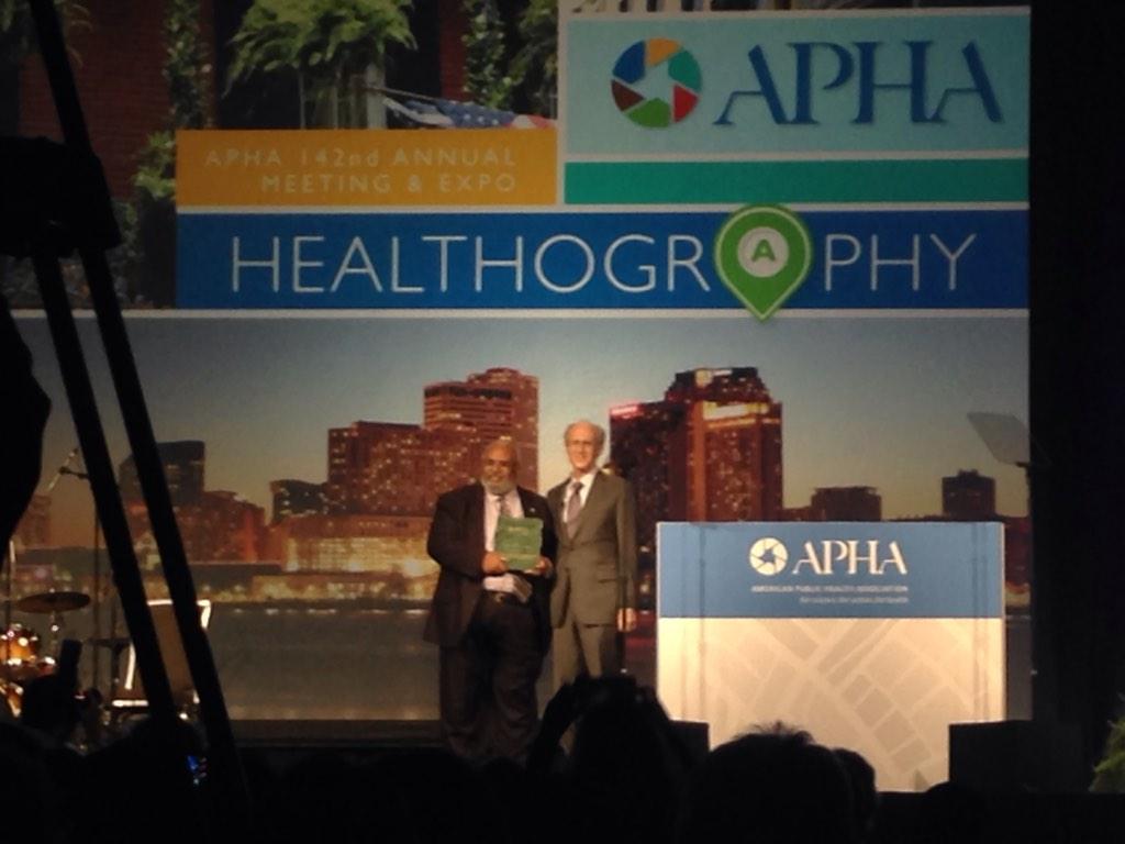 Dr Peter #Salk accepts <a href="/PublicHealth/">APHA</a> award on behalf of father who developed #polio vax @PittPubHlth #APHA14