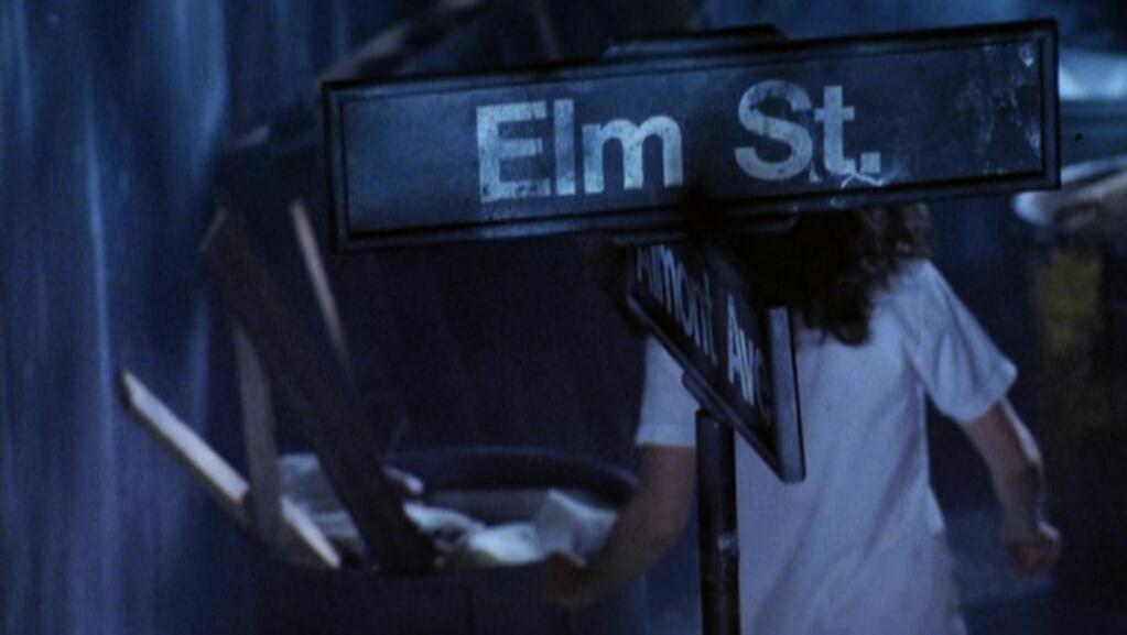 HorrorCon2013's tweet photo. A deleted scene from @wescraven's A Nightmare on Elm Street showing Nancy & the Elm Street sign. #30YearsofNightmare http://t.co/aL65gT1Lmh