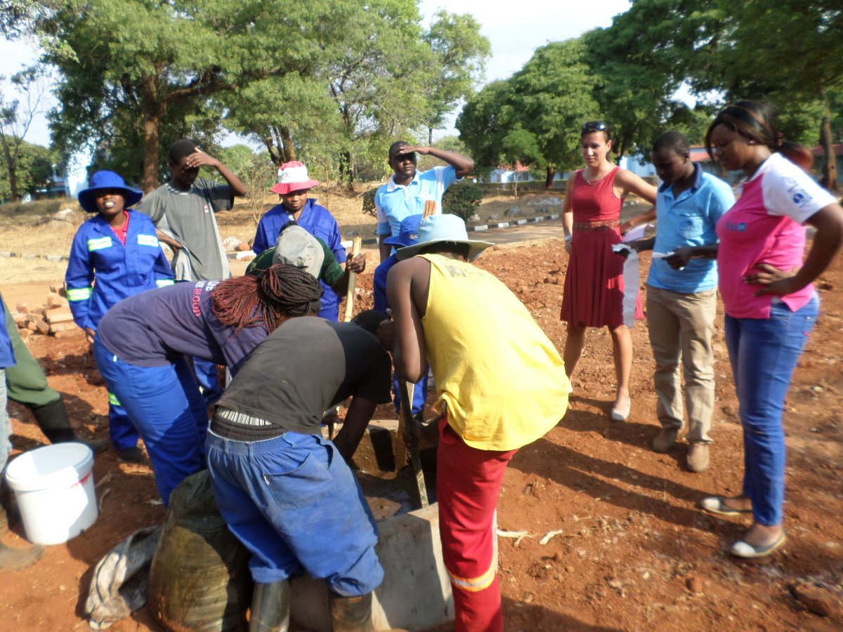 Initial feeding of a 20m3 biogas digester taking place at Chibhero college Chegutu @DagmarZwebe @SNV_RE