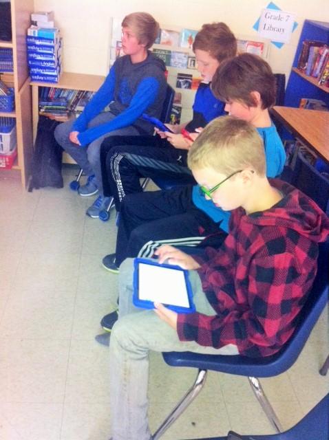PaulyneCass's tweet photo. Reading "The Rabbits" - our 7s commenting and questioning #pointofview via @googledocs @orchardpark7 http://t.co/mdIMO6jD6p