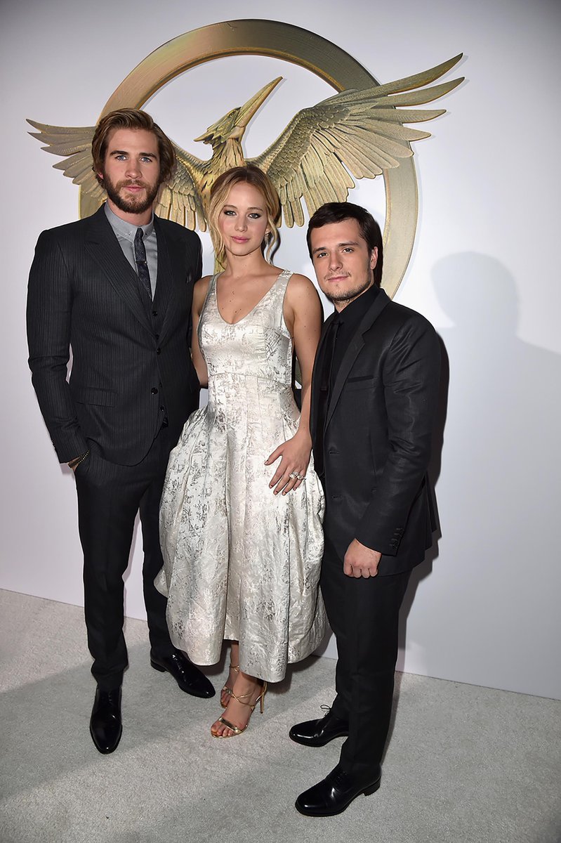 Jennifer Lawrence, Josh Hutcherson and @LiamHemsworth at the LA premiere of  \, image size:799x1200
