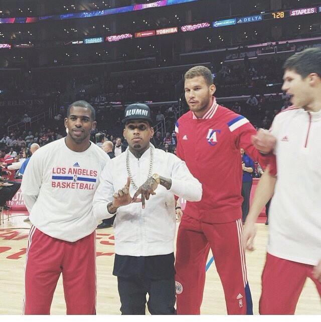 WhiteBballPains's tweet photo. Doug McDermott tries to join a picture with CP3, Blake Griffin and Kid Ink, gets #WhiteBballPain'ed http://t.co/QaPbxFqAq9