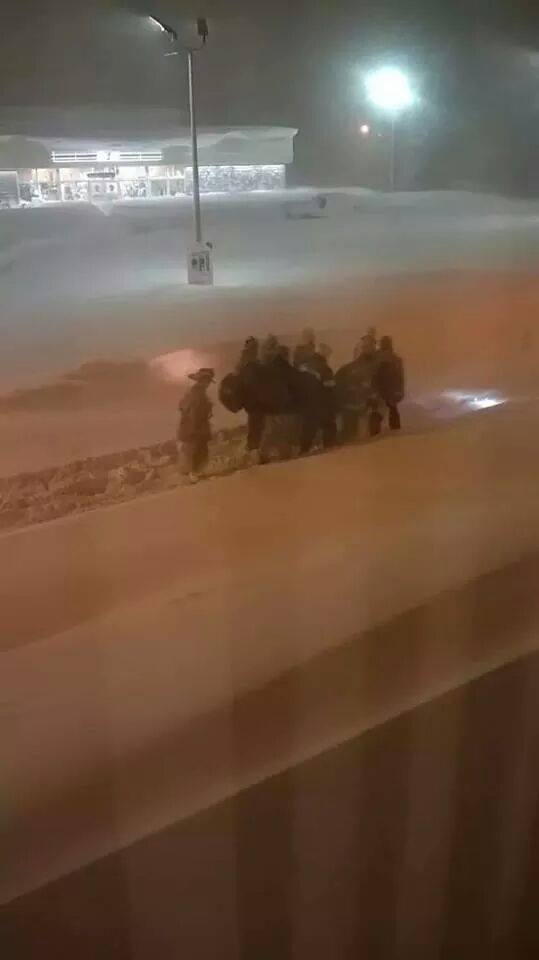 deepthinka's tweet photo. They don't call Buffalo the city of good neighbors for no reason, Firemen carrying a person to a hospital. #Respect http://t.co/K5AFhAPj8E
