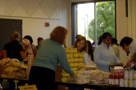 B_H_T_F's tweet photo. Volunteers pass out food item to the residents. http://t.co/paMC3qmKEH
