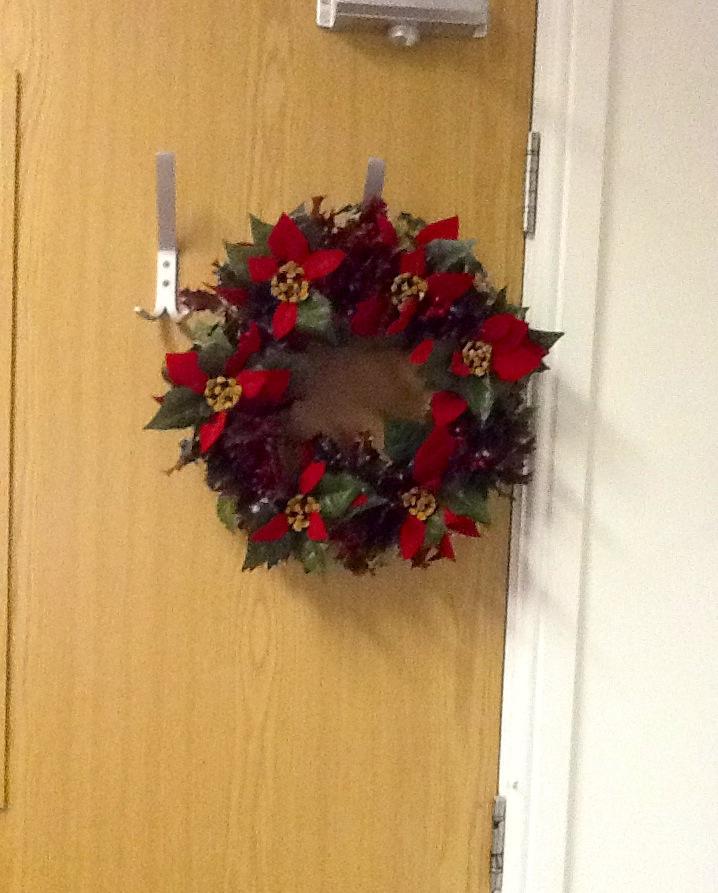 decorativeb's tweet photo. A wreath which one of our customers have created from using our wooden wreaths! #holly #wreath #doordec #DIY http://t.co/ar9C6SKLNp