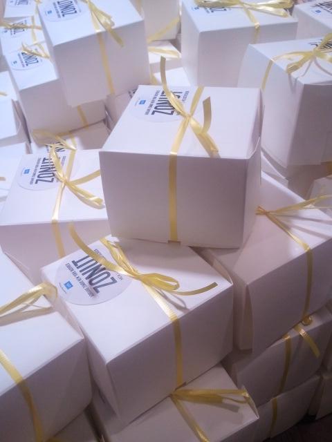 MCA_Australia's tweet photo. Magic tricks, polaroid film and 400+ #zonuts. Prepping for tonight’s opening party #ClosetoChuck @zumbopatisserie http://t.co/15nPAeOOuF